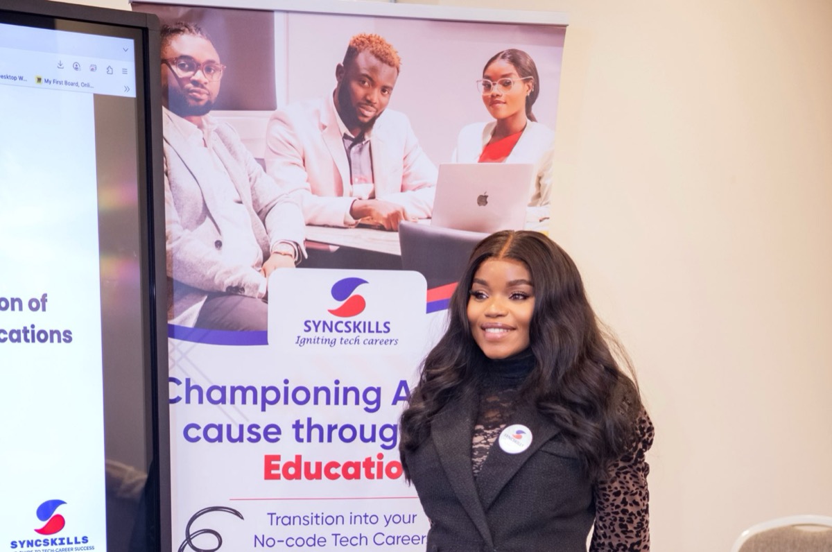 Tayo Oloja speaking at SyncSkills event